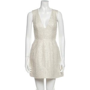 Shimmery white Alice + Olivia dress w/deep V cut